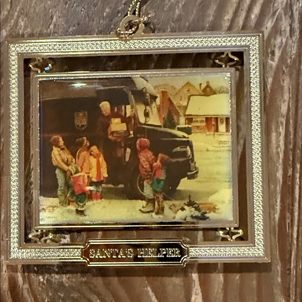 Norman Rockwell 1947 painting “Santa's Helper” gold metal Holiday Ornament